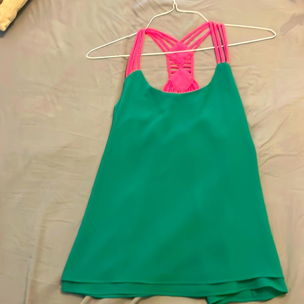 Small green and pink tank top. Great condition!